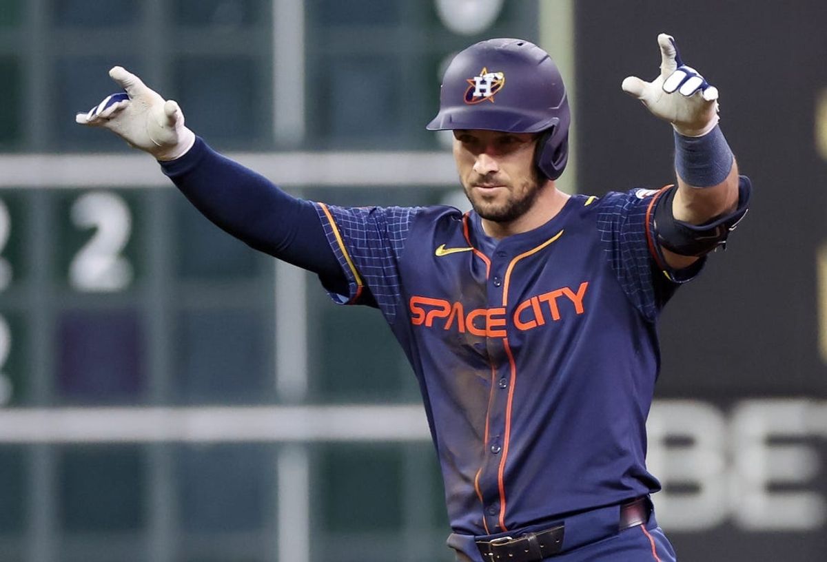 May 13, 2024; Houston, Texas, USA; Houston Astros third baseman Alex Bregman (2) reacts after hitting a two run RBI double against the Oakland Athletics in the eighth inning at Minute Maid Park. Mandatory Credit: Thomas Shea-USA TODAY Sports