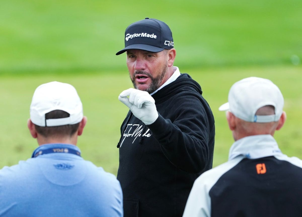 Michael Block, center, chats with folks on the driving range during a practice round in the PGA Championship at the Valhalla Golf Course in Louisville, Ky. on May. 14, 2024.