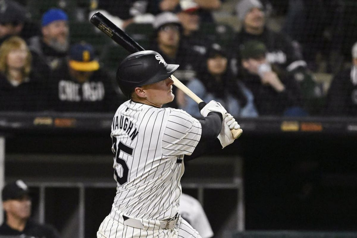 May 14, 2024; Chicago, Illinois, USA; Chicago White Sox first baseman Andrew Vaughn (25) hits a home run against the Washington Nationals during the eighth inning at Guaranteed Rate Field. Mandatory Credit: Matt Marton-USA TODAY Sports