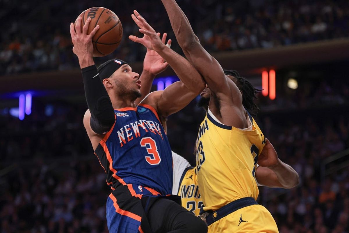May 14, 2024; New York, New York, USA; New York Knicks guard Josh Hart (3) drives for a shot against Indiana Pacers forward Aaron Nesmith (23) and center Myles Turner (33) during the second half during game five of the second round for the 2024 NBA playoffs at Madison Square Garden. Mandatory Credit: Vincent Carchietta-USA TODAY Sports