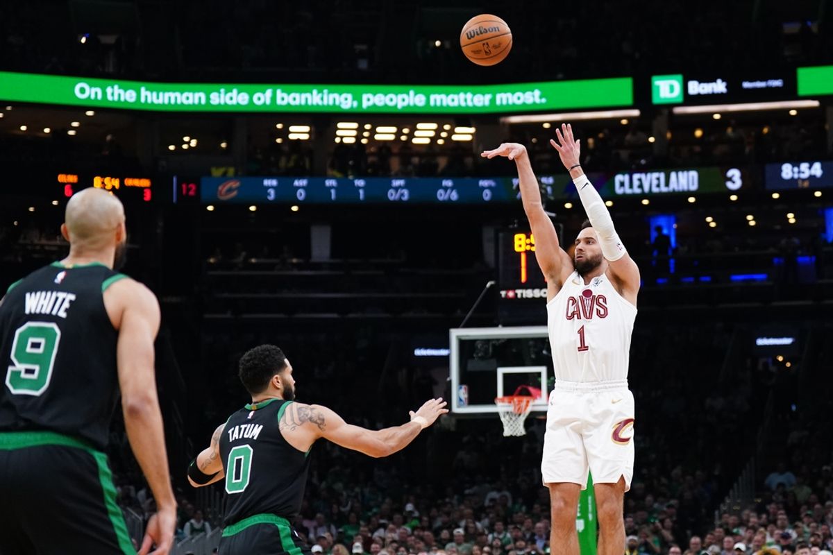 May 15, 2024; Boston, Massachusetts, USA; Cleveland Cavaliers guard Max Strus (1) shoots against Boston Celtics forward Jayson Tatum (0) in the first quarter during game five of the second round for the 2024 NBA playoffs at TD Garden. Mandatory Credit: David Butler II-Imagn Images