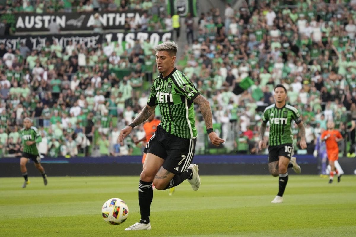 May 15, 2024; Austin, Texas, USA; Austin FC midfielder Emiliano Rigoni (7) controls the ball in the first half against Houston Dynamo FC at Q2 Stadium. Mandatory Credit: Scott Wachter-USA TODAY Sports