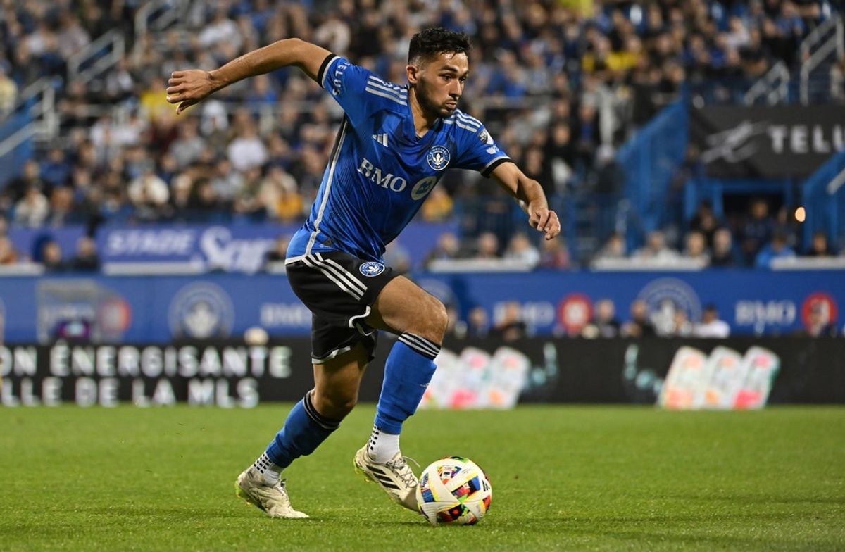 May 15, 2024; Montreal, Quebec, CAN; CF Montreal midfielder Mathieu Choiniere (29) dribbles during the second half against the Columbus Crew at Stade Saputo. Mandatory Credit: David Kirouac-Imagn Images
