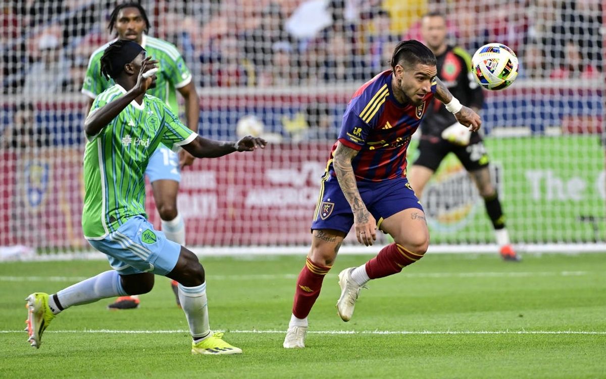May 15, 2024; Sandy, Utah, USA; Real Salt Lake forward Cristian Arango (9) controls the ball against Seattle Sounders FC forward Georgi Minoungou (93) during the first half at America First Field. Mandatory Credit: Christopher Creveling-USA TODAY Sports