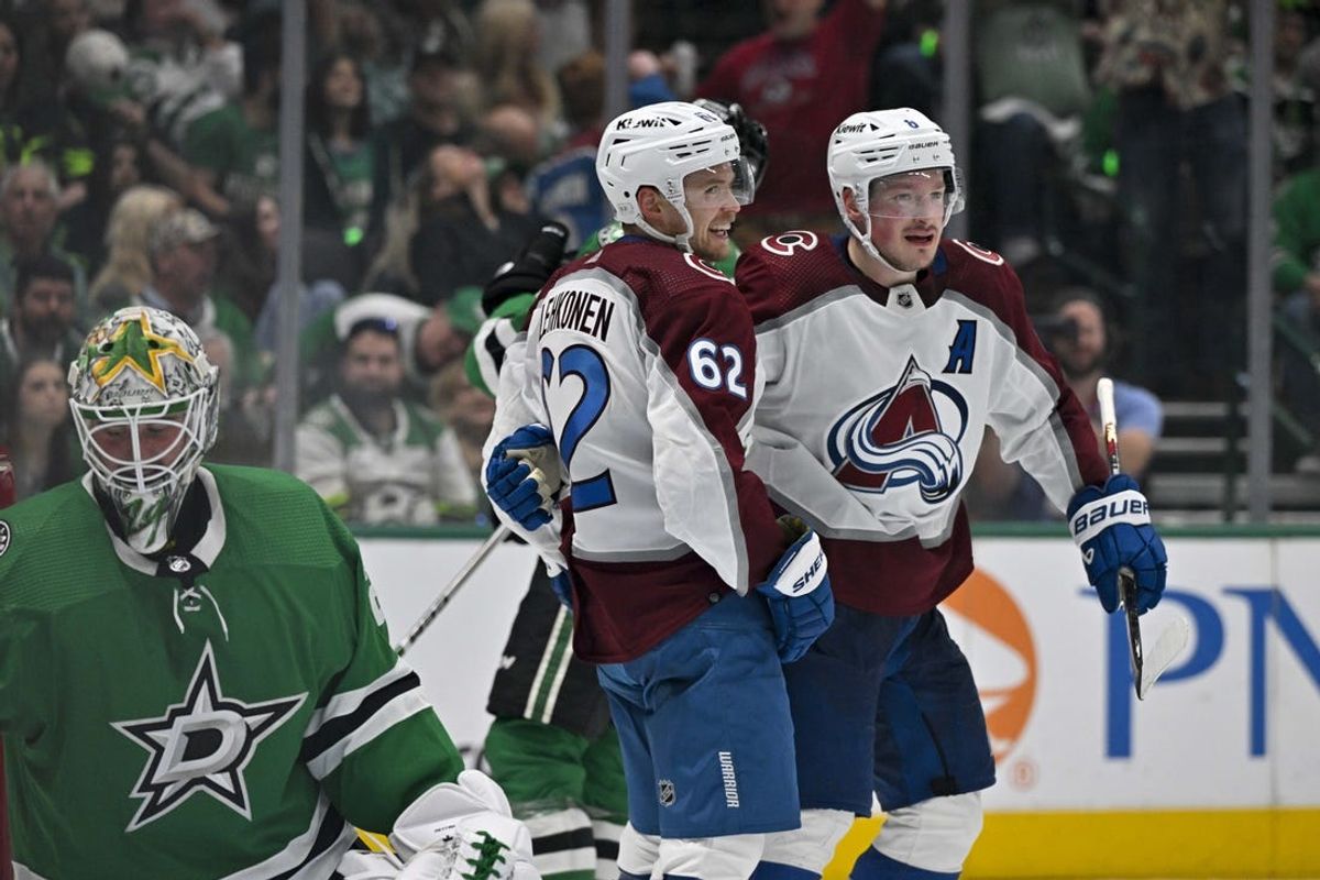 May 15, 2024; Dallas, Texas, USA; Colorado Avalanche left wing Artturi Lehkonen (62) and defenseman Cale Makar (8) celebrates a goal scored by Makar against Dallas Stars goaltender Jake Oettinger (29) during the third period in game five of the second round of the 2024 Stanley Cup Playoffs at American Airlines Center. Mandatory Credit: Jerome Miron-USA TODAY Sports