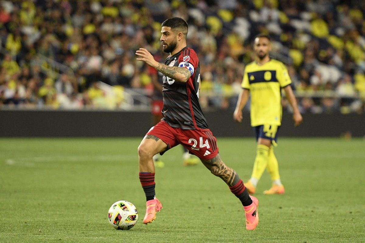 May 15, 2024; Nashville, Tennessee, USA; Toronto FC forward Lorenzo Insigne (24) kicks the ball against Nashville SC during the second half at Geodis Park. Mandatory Credit: Steve Roberts-USA TODAY Sports