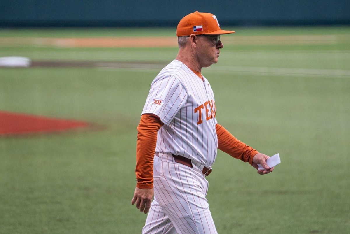 Texas Head Coach David Pierce heads for the dugout ahead of the Longhorns' game against the Kansas Jayhawks, Thursday, May 16, 2024 at UFCU Disch-Falk Field in Austin.