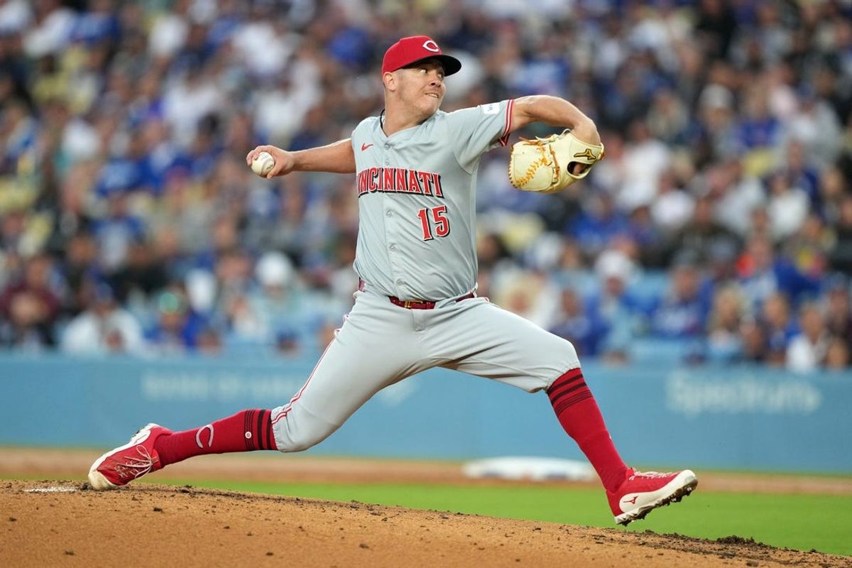May 16, 2024; Los Angeles, California, USA; Cincinnati Reds pitcher Emilio Pagan (15) throws in the first inning against the Los Angeles Dodgers  at Dodger Stadium. Mandatory Credit: Kirby Lee-USA TODAY Sports