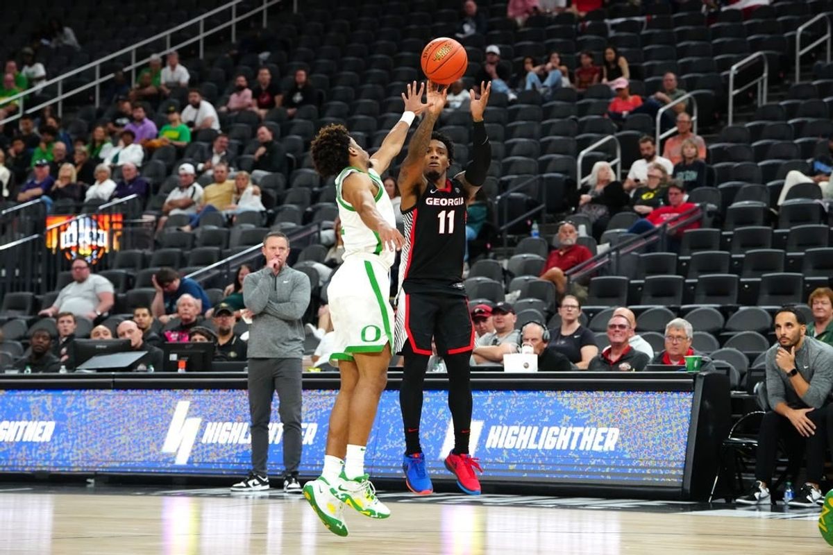 Nov 6, 2023; Las Vegas, Nevada, USA; Georgia Bulldogs guard Justin Hill (11) shoots against Oregon Ducks guard Jadrian Tracey (22) during the second half at T-Mobile Arena.