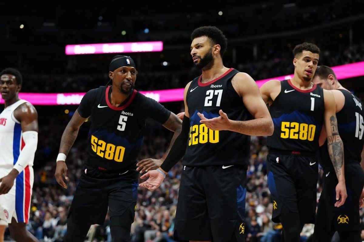 Jan 7, 2024; Denver, Colorado, USA; Denver Nuggets guard Jamal Murray (27) and guard Kentavious Caldwell-Pope (5) and forward Michael Porter Jr. (1) in the first quarter against the Detroit Pistons at Ball Arena.