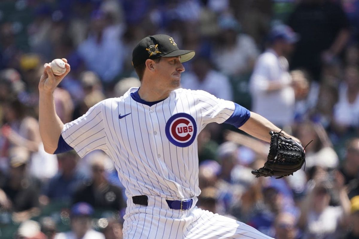 May 17, 2024; Chicago, Illinois, USA; Chicago Cubs pitcher Kyle Hendricks (28) throws the ball against the Pittsburgh Pirates during the first inning at Wrigley Field. Mandatory Credit: David Banks-USA TODAY Sports