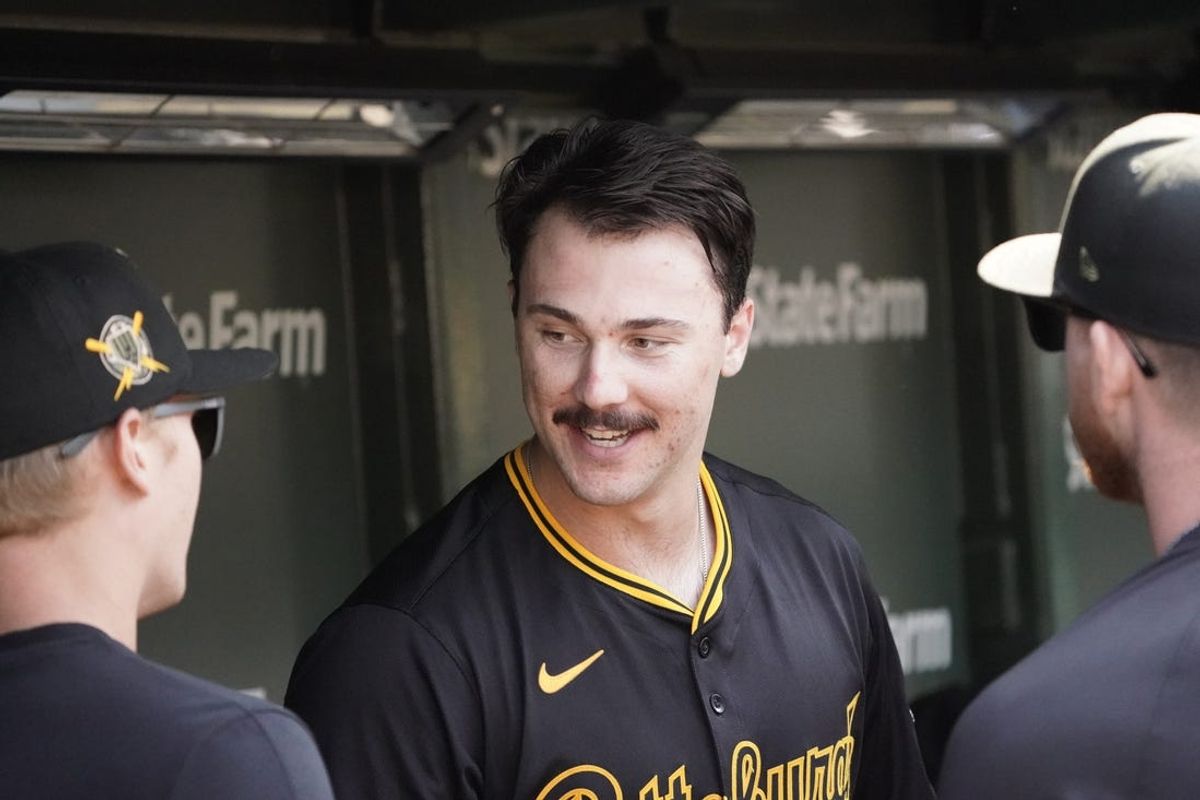 May 17, 2024; Chicago, Illinois, USA; Pittsburgh Pirates pitcher Paul Skenes (center) is congratulated in the dugout after pitching six complete no-hit innings against the Chicago Cubs at Wrigley Field. Mandatory Credit: David Banks-USA TODAY Sports