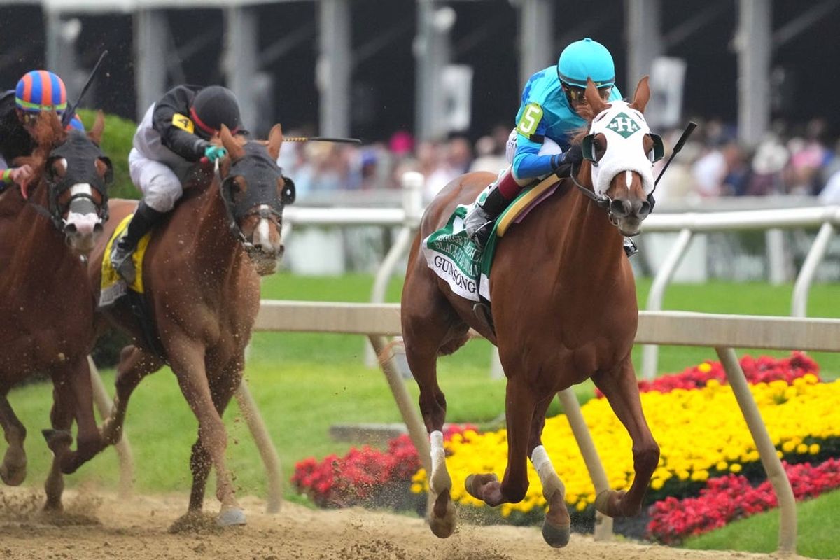 May 17, 2024; Baltimore, Maryland, USA; Gun Song and jockey John Velazquez win the Black Eyed Susan Stakes at Pimlico Race Course. Mandatory Credit: Mitch Stringer-USA TODAY Sports