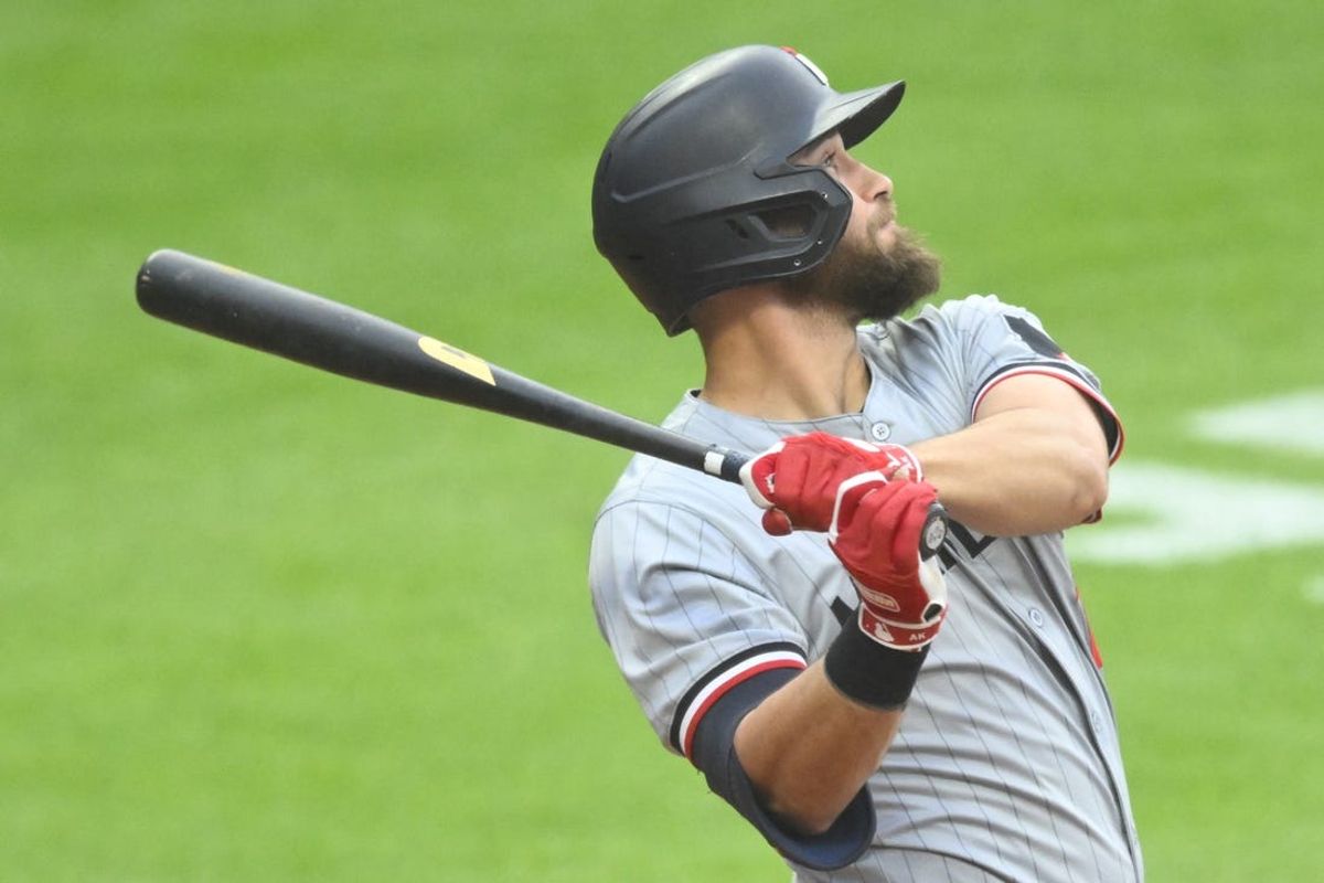 May 17, 2024; Cleveland, Ohio, USA; Minnesota Twins left fielder Alex Kirilloff (19) hits a solo home run in the third inning against the Cleveland Guardians at Progressive Field. Mandatory Credit: David Richard-USA TODAY Sports
