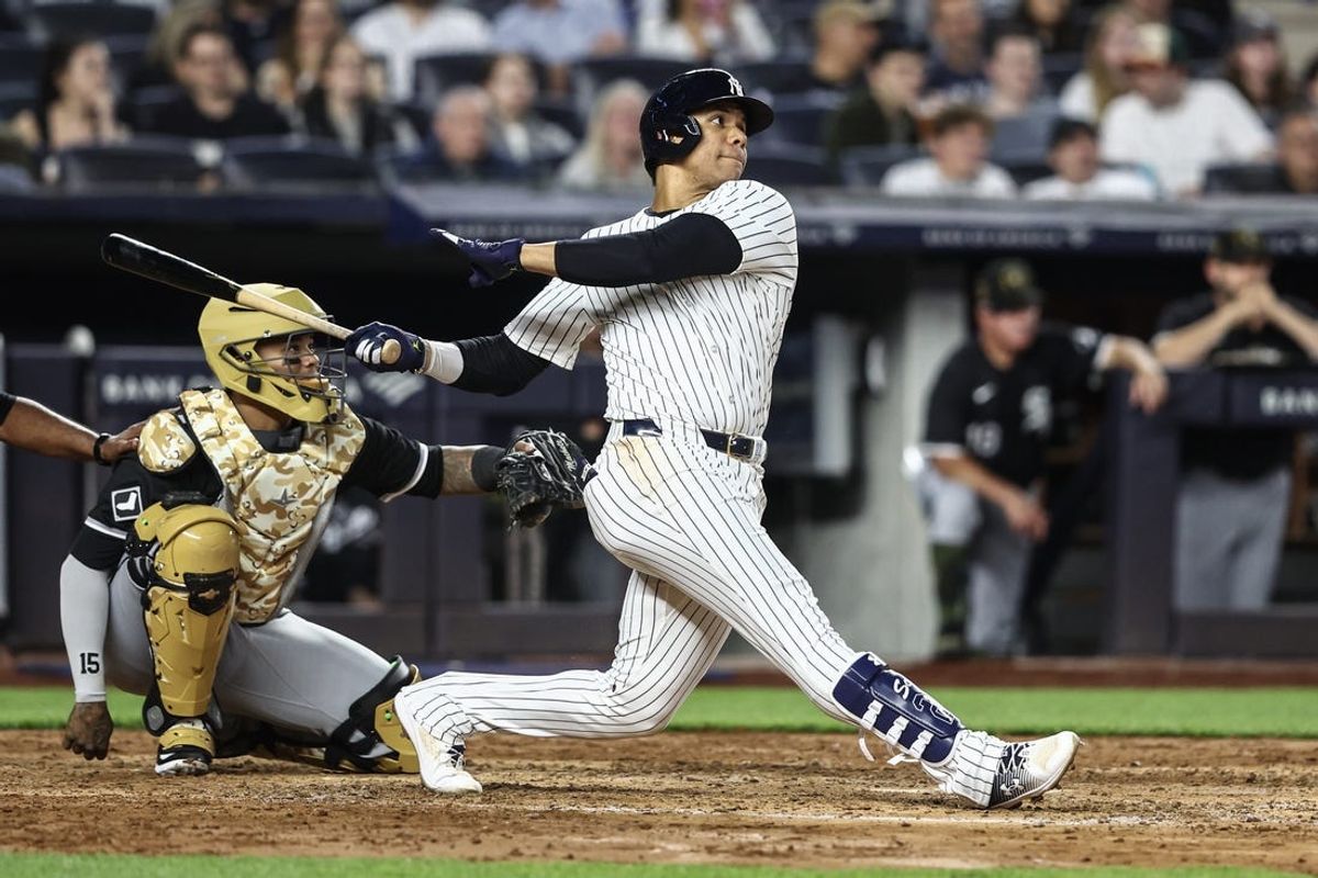 May 17, 2024; Bronx, New York, USA;  New York Yankees right fielder Juan Soto (22) hits a double in the fifth inning against the Chicago White Sox at Yankee Stadium. Mandatory Credit: Wendell Cruz-USA TODAY Sports