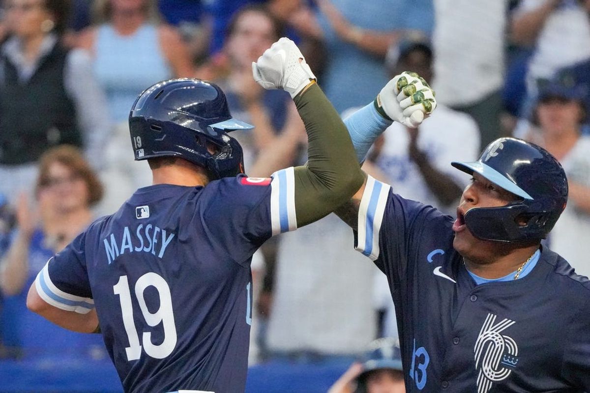 May 17, 2024; Kansas City, Missouri, USA; Kansas City Royals second baseman Michael Massey (19) celebrates with catcher Salvador Perez (13) after hitting a two-run home run against the Oakland Athletics in the sixth inning at Kauffman Stadium. Mandatory Credit: Denny Medley-USA TODAY Sports