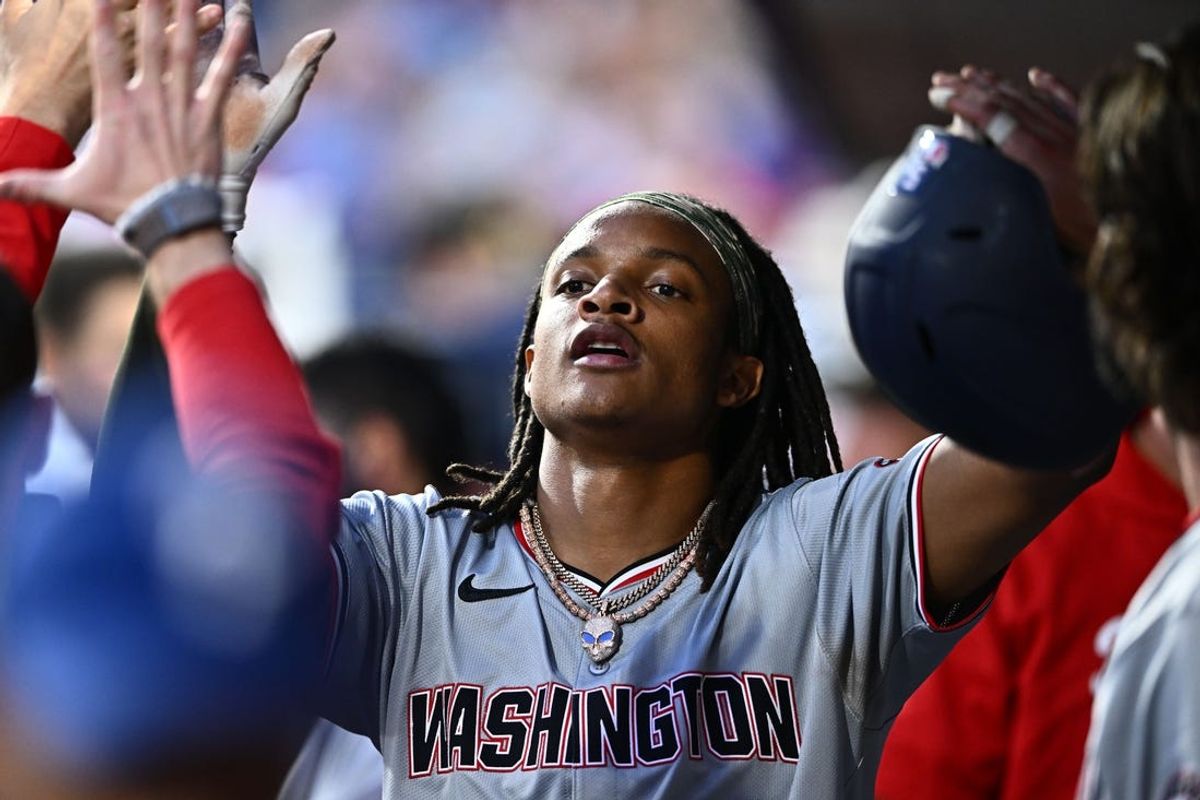 May 17, 2024; Philadelphia, Pennsylvania, USA; Washington Nationals infielder CJ Abrams (5) celebrates with teammates after scoring against the Philadelphia Phillies in the fifth inning at Citizens Bank Park. Mandatory Credit: Kyle Ross-USA TODAY Sports