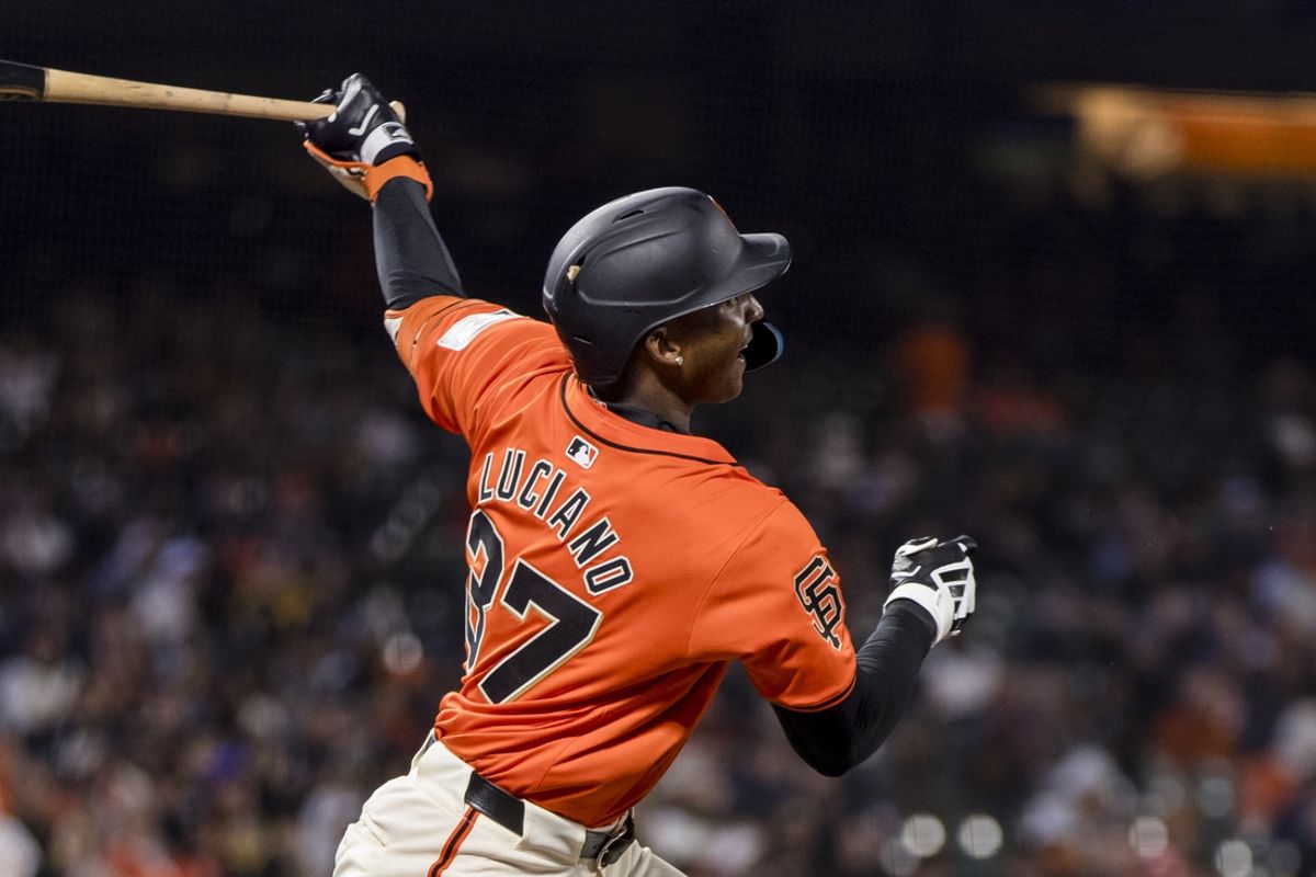 May 17, 2024; San Francisco, California, USA; San Francisco Giants shortstop Marco Luciano (37) hits an RBI single against the Colorado Rockies during the seventh inning at Oracle Park. Mandatory Credit: John Hefti-USA TODAY Sports