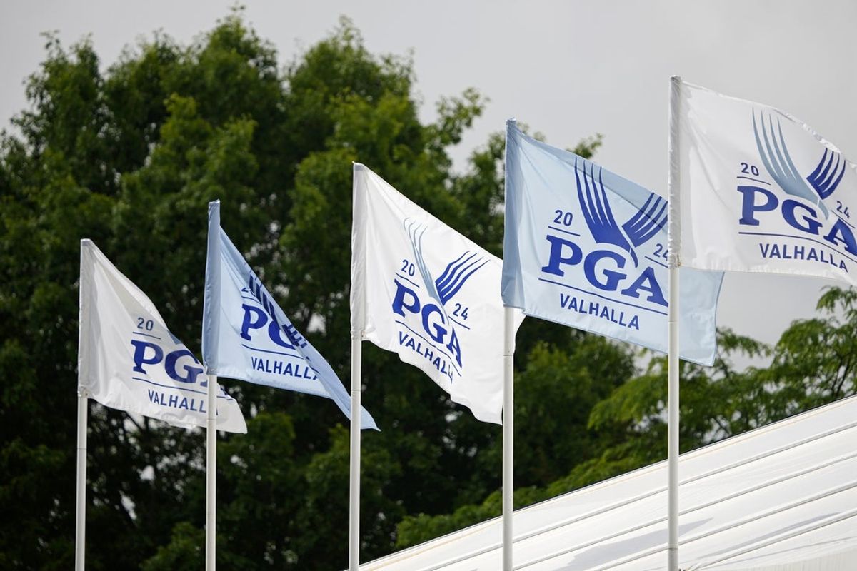 May 18, 2024; Louisville, Kentucky, USA; A detail view of PGA flags near the 17th green before the third round of the PGA Championship golf tournament at Valhalla Golf Club. Mandatory Credit: Adam Cairns-Imagn Images