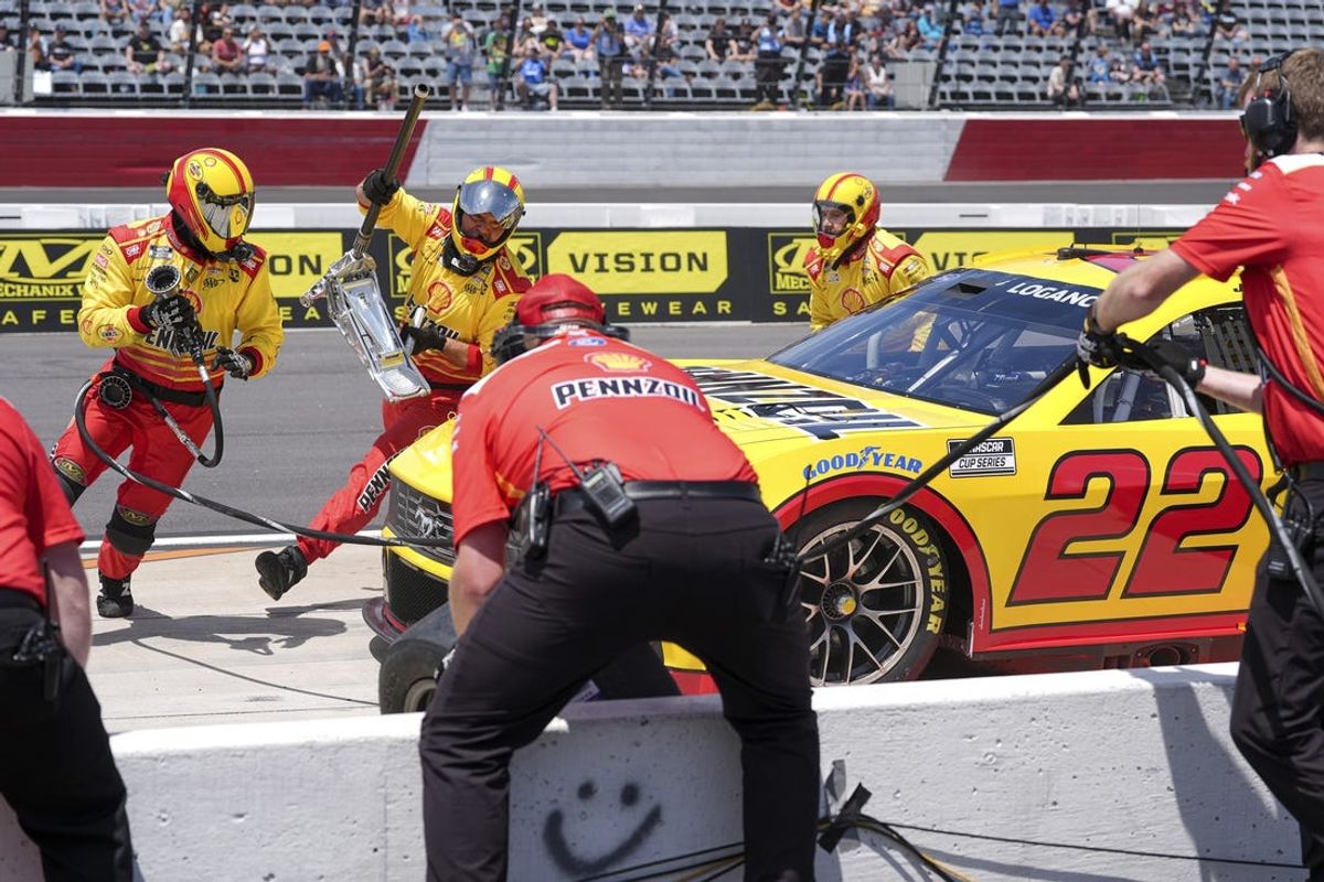 May 18, 2024; North Wilkesboro, North Carolina, USA; NASCAR Cup Series driver Joey Logano (22) pit crew at work during the pit crew challenge portion during qualifying at North Wilkesboro Speedway. Mandatory Credit: Jim Dedmon-USA TODAY Sports