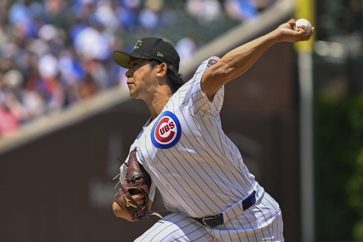 May 18, 2024; Chicago, Illinois, USA; Chicago Cubs pitcher Shota Imanaga (18) delivers against the Pittsburgh Pirates during the first inning at Wrigley Field. Mandatory Credit: Matt Marton-USA TODAY Sports