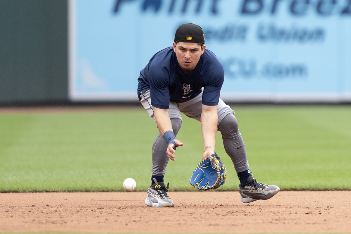 May 18, 2024; Baltimore, Maryland, USA; Seattle Mariners third baseman Luis Urias (16) takes infield practice prior to the game against the Baltimore Orioles at Oriole Park at Camden Yards. Mandatory Credit: Gregory Fisher-Imagn Images