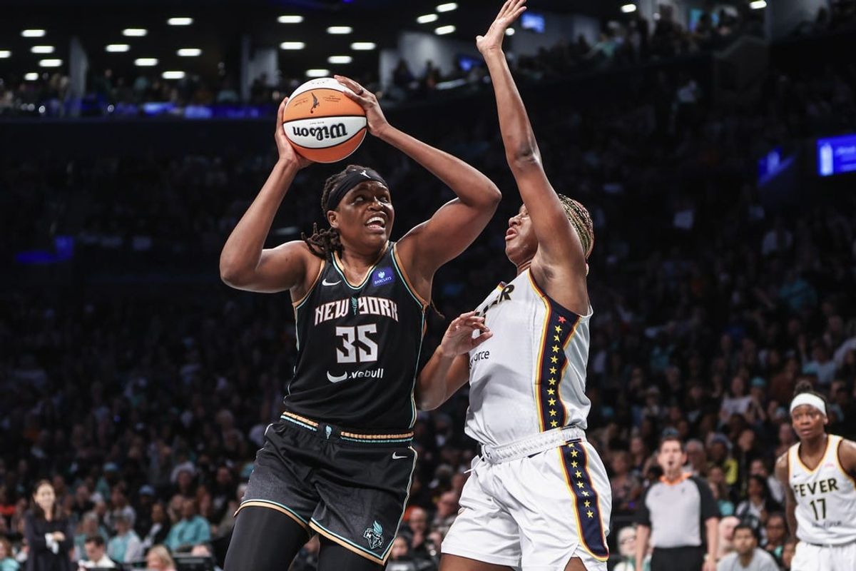 May 18, 2024; Brooklyn, New York, USA;  New York Liberty forward Jonquel Jones (35) looks to post up against Indiana Fever forward Aliyah Boston (7) in the fourth quarter at Barclays Center. Mandatory Credit: Wendell Cruz-USA TODAY Sports