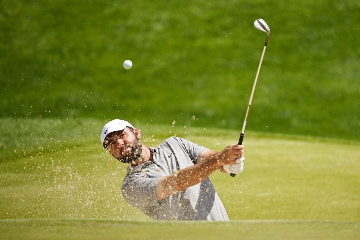 May 18, 2024; Louisville, Kentucky, USA; Scottie Scheffler plays a shot from a bunker on the seventh hole during the third round of the PGA Championship golf tournament at Valhalla Golf Club. Mandatory Credit: Adam Cairns-USA TODAY Sports