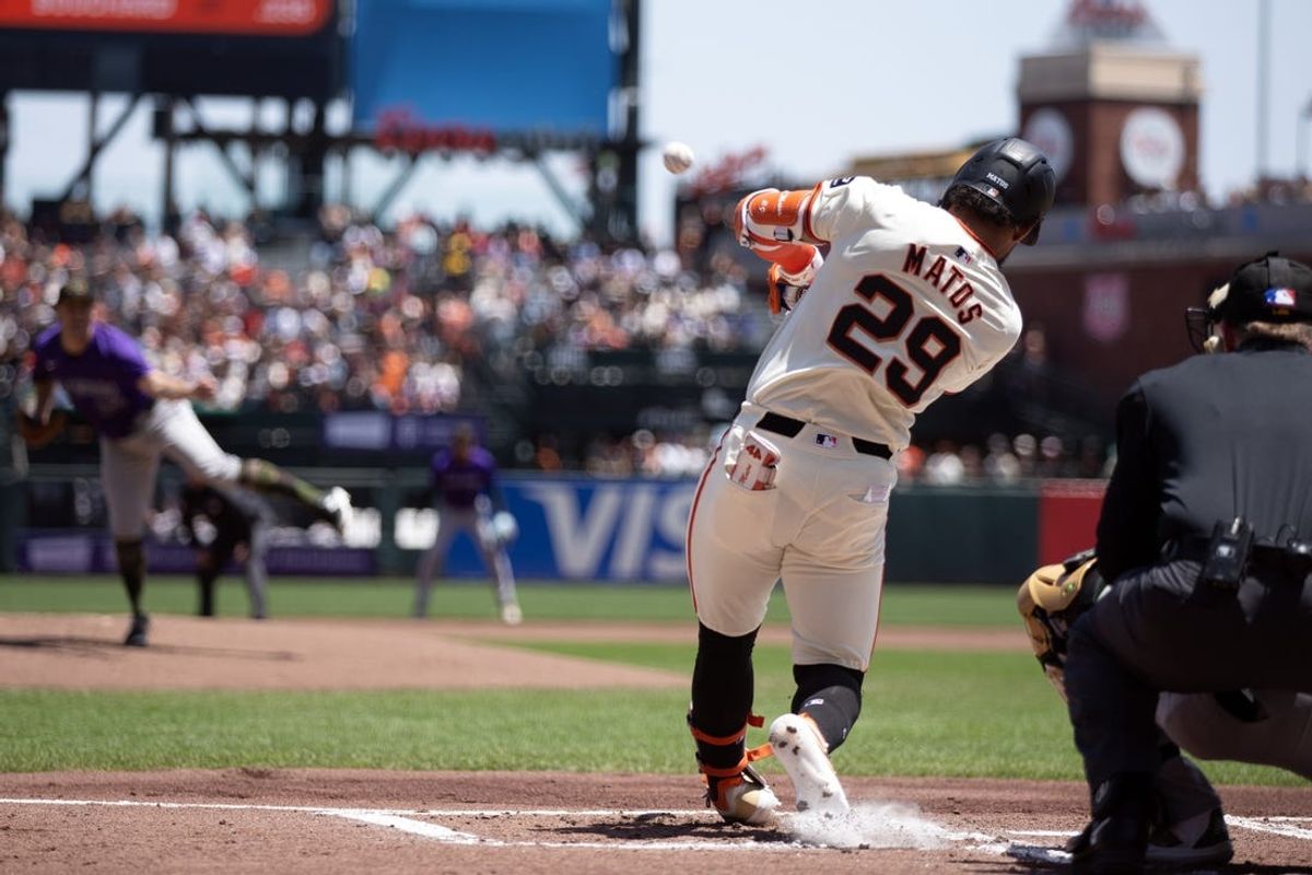 May 18, 2024; San Francisco, California, USA; San Francisco Giants center fielder Luis Matos (29) connects for a three-run home run off Colorado Rockies starting pitcher Ty Blach (50) during the first inning at Oracle Park. Mandatory Credit: D. Ross Cameron-USA TODAY Sports