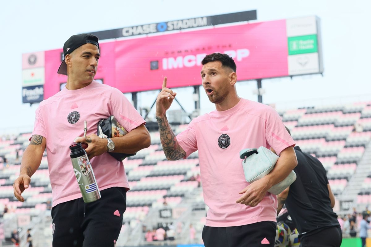 May 18, 2024; Fort Lauderdale, Florida, USA; Inter Miami CF forward Luis Suarez (9) and forward Lionel Messi (10) arrive before the game against D.C. United at Chase Stadium. Mandatory Credit: Sam Navarro-USA TODAY Sports