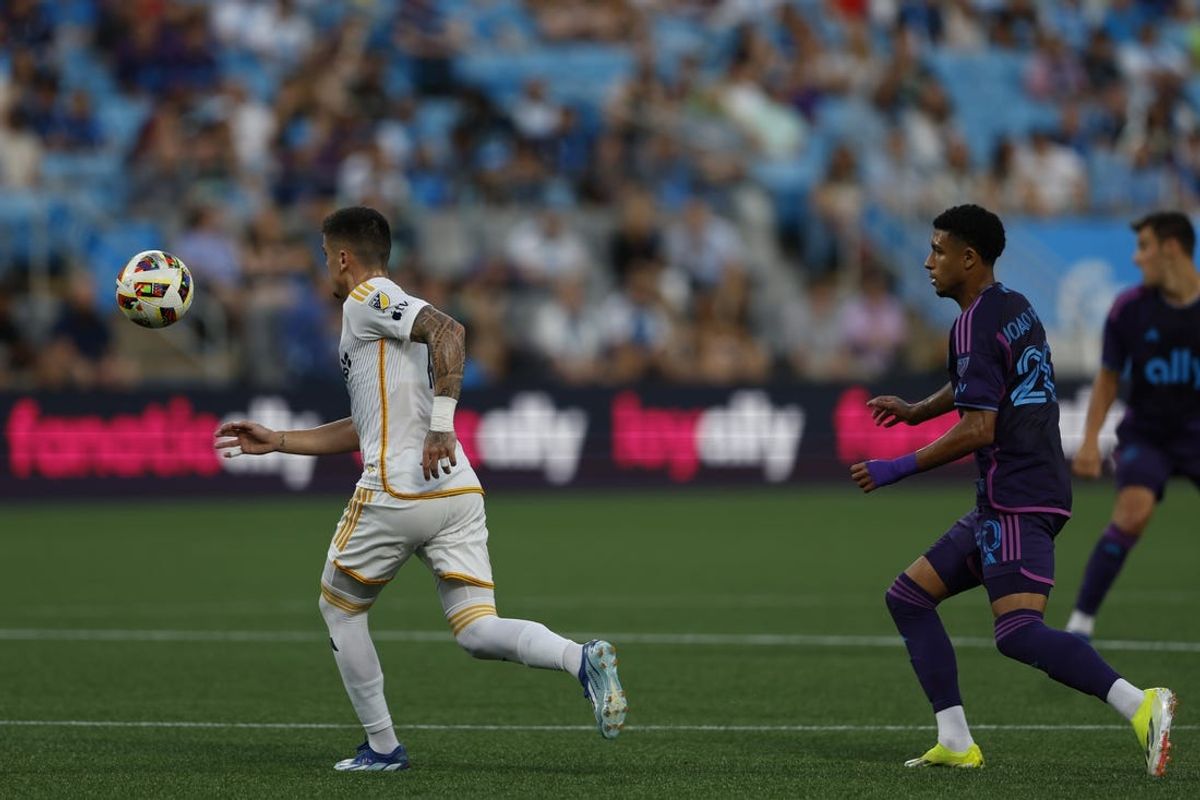May 18, 2024; Charlotte, North Carolina, USA; LA Galaxy forward Gabriel Pec (11) chases a ball during the first half against Charlotte FC at Bank of America Stadium. Mandatory Credit: Nell Redmond-USA TODAY Sports