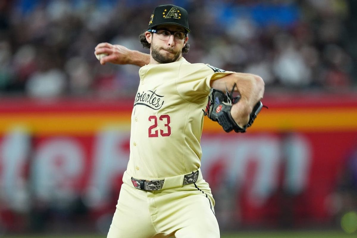 May 18, 2024; Phoenix, Arizona, USA; Arizona Diamondbacks pitcher Zac Gallen (23) pitches against the Detroit Tigers during the fourth inning at Chase Field. Mandatory Credit: Joe Camporeale-USA TODAY Sports