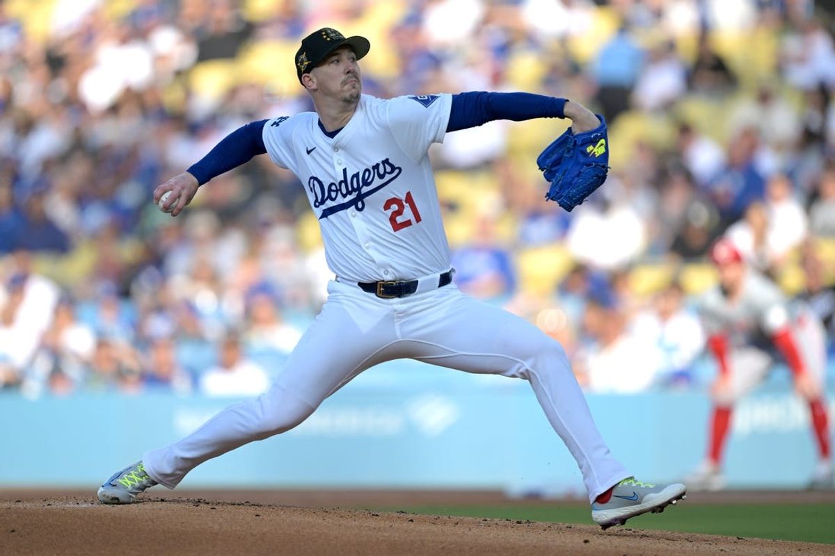 May 18, 2024; Los Angeles, California, USA;  Los Angeles Dodgers starting pitcher Walker Buehler (21) delivers to the plate in the first inning against the Cincinnati Reds at Dodger Stadium. Mandatory Credit: Jayne Kamin-Oncea-USA TODAY Sports