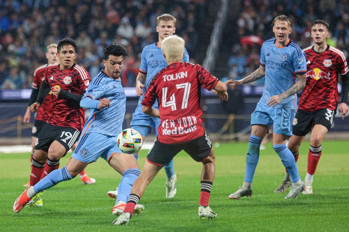 May 18, 2024; Queens, New York, USA; New York City FC forward Monsef Bakrar (9) plays the ball against New York Red Bulls defender John Tolkin (47) during the second half at Citi Field. Mandatory Credit: Vincent Carchietta-USA TODAY Sports