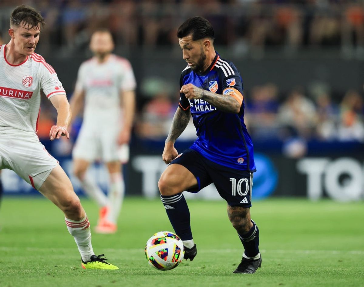 May 18, 2024; Cincinnati, Ohio, USA; FC Cincinnati midfielder Luciano Acosta (10) dribbles the ball during the second half against St. Louis CITY SC at TQL Stadium. Mandatory Credit: Katie Stratman-USA TODAY Sports