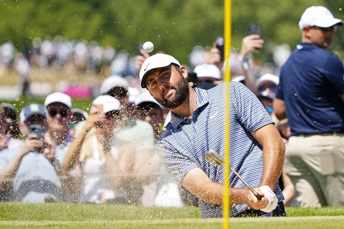 May 19, 2024; Louisville, Kentucky, USA; (Editors Notes: Caption Correction) Scottie Scheffler plays a shot from a bunker on the first hole during the final round of the PGA Championship golf tournament at Valhalla Golf Club. Mandatory Credit: Adam Cairns-USA TODAY Sports