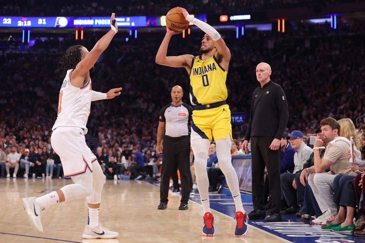 May 19, 2024; New York, New York, USA; Indiana Pacers guard Tyrese Haliburton (0) shoots a three point shot against New York Knicks guard Jalen Brunson (11) during the first quarter of game seven of the second round of the 2024 NBA playoffs at Madison Square Garden. Mandatory Credit: Brad Penner-USA TODAY Sports