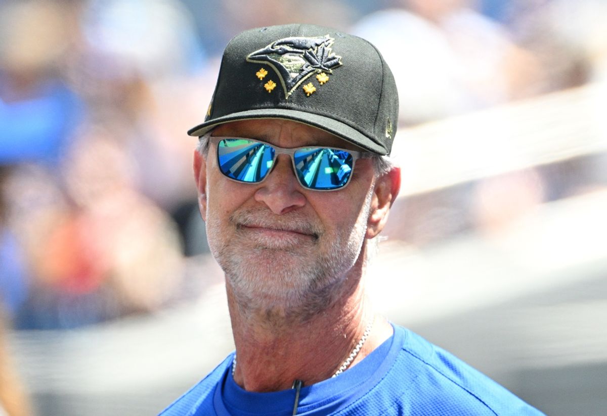 May 19, 2024; Toronto, Ontario, CAN;  Toronto Blue Jays bench coach and offensive co-ordinator Don Mattingly (23) looks on from the bench before play begins against the Tampa Bay Rays at Rogers Centre. Mandatory Credit: Dan Hamilton-Imagn Images