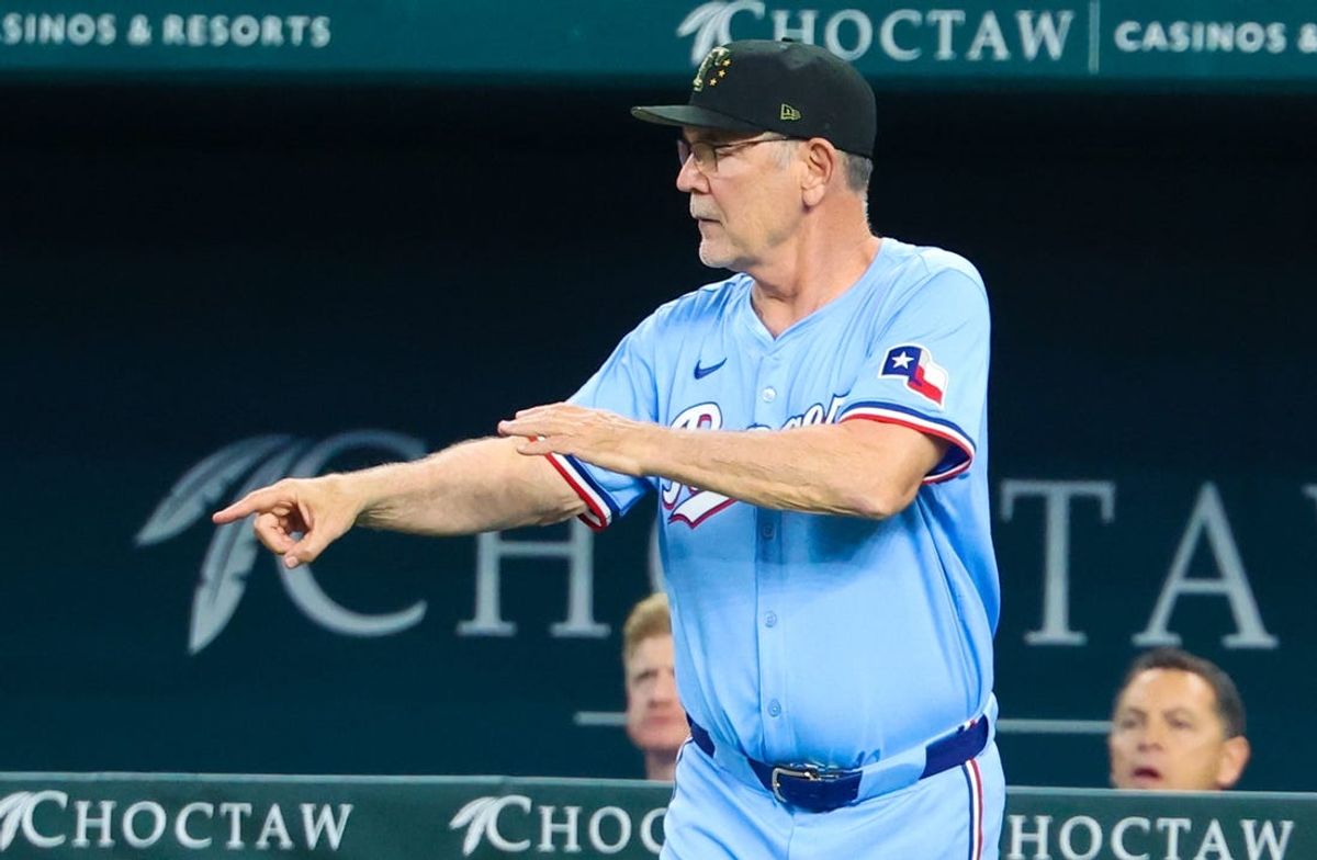 May 19, 2024; Arlington, Texas, USA; Texas Rangers manager Bruce Bochy (15) makes a pitching change during the seventh inning against the Los Angeles Angels at Globe Life Field. Mandatory Credit: Kevin Jairaj-USA TODAY Sports