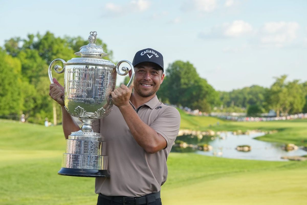 Xander Schauffele holds the Wanamaker Trophy on Sunday, May 19, 2024 after going -21 during the PGA Championship at Valhalla Golf Course.