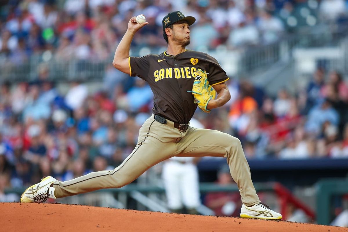 May 19, 2024; Atlanta, Georgia, USA; San Diego Padres starting pitcher Yu Darvish (11) throws against the Atlanta Braves in the second inning at Truist Park. Mandatory Credit: Brett Davis-USA TODAY Sports
