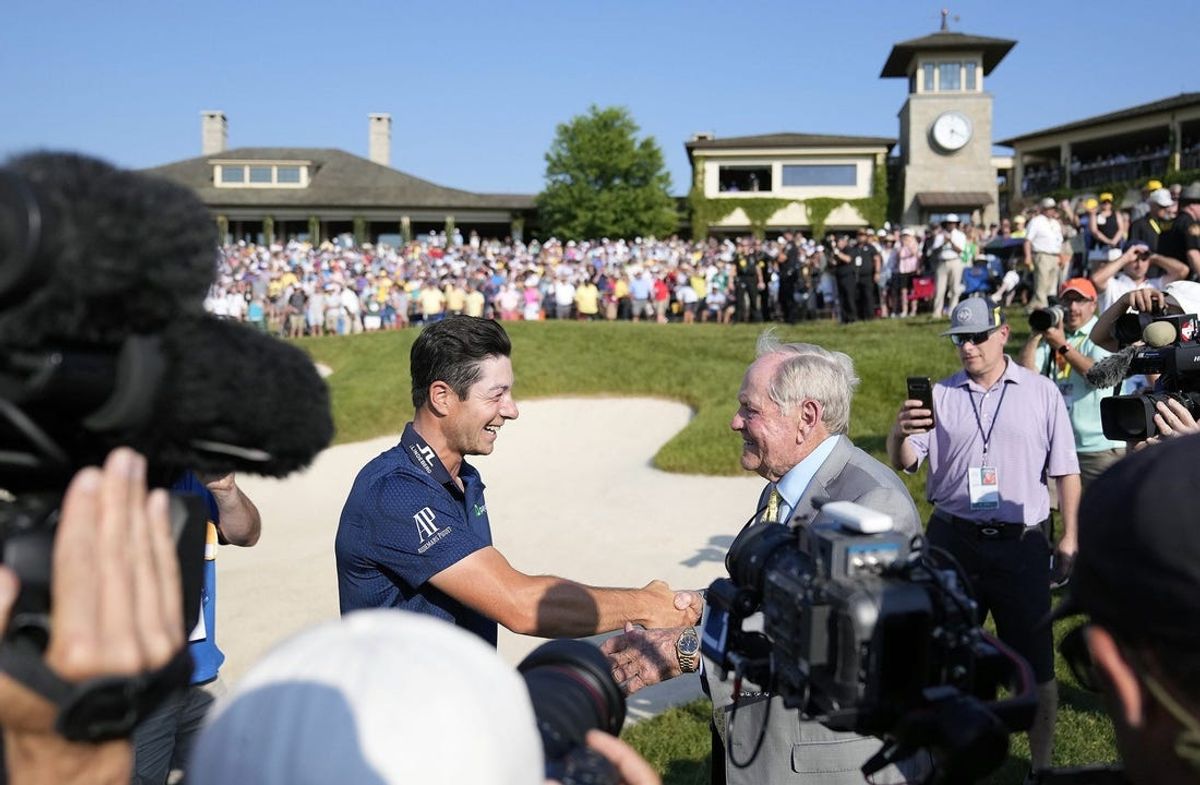 June 4, 2023: Dublin, Ohio, USA; Viktor Hovland shakes the hand of Jack Nicklaus and after beating Denny McCarthy in a playoff to win the 2023 Memorial Tournament at Muirfield Village Golf Club.