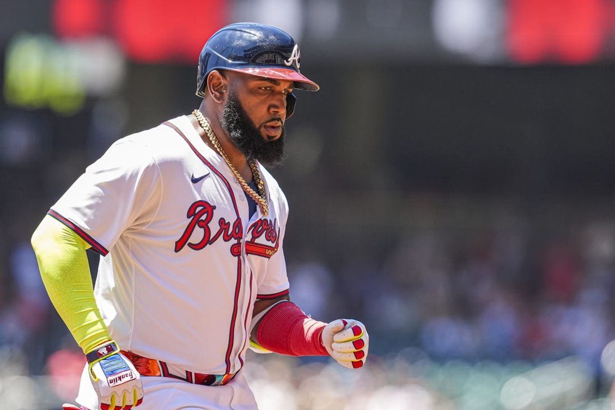 May 20, 2024; Cumberland, Georgia, USA; Atlanta Braves designated hitter Marcell Ozuna (20) reacts after hitting a home run against the San Diego Padres during the third inning at Truist Park. Mandatory Credit: Dale Zanine-USA TODAY Sports