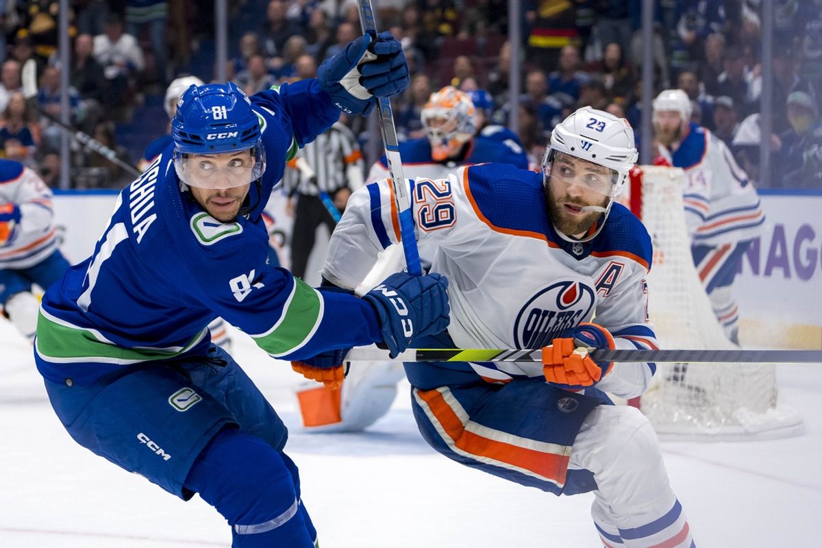 May 20, 2024; Vancouver, British Columbia, CAN; Vancouver Canucks forward Dakota Joshua (81) battles with Edmonton Oilers forward Leon Draisaitl (29) during the third period in game seven of the second round of the 2024 Stanley Cup Playoffs at Rogers Arena. Mandatory Credit: Bob Frid-Imagn Images