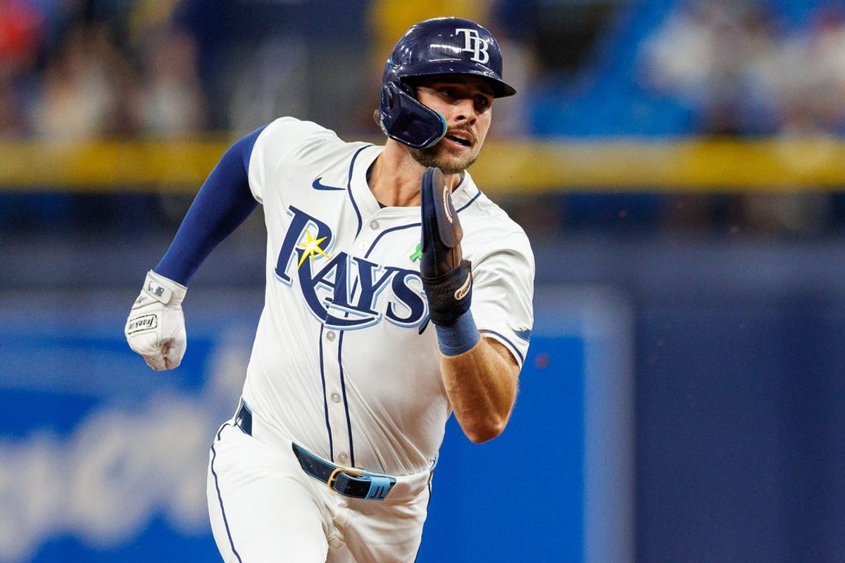 May 21, 2024; St. Petersburg, Florida, USA;  Tampa Bay Rays designated hitter Josh Lowe (15) runs to third base against the Boston Red Sox in the first inning at Tropicana Field. Mandatory Credit: Nathan Ray Seebeck-USA TODAY Sports