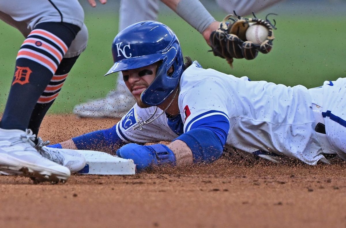 May 21, 2024; Kansas City, Missouri, USA;  Kansas City Royals shortstop Bobby Witt Jr. (7) steals second base in the first inning against the Detroit Tigers  at Kauffman Stadium. Mandatory Credit: Peter Aiken-USA TODAY Sports