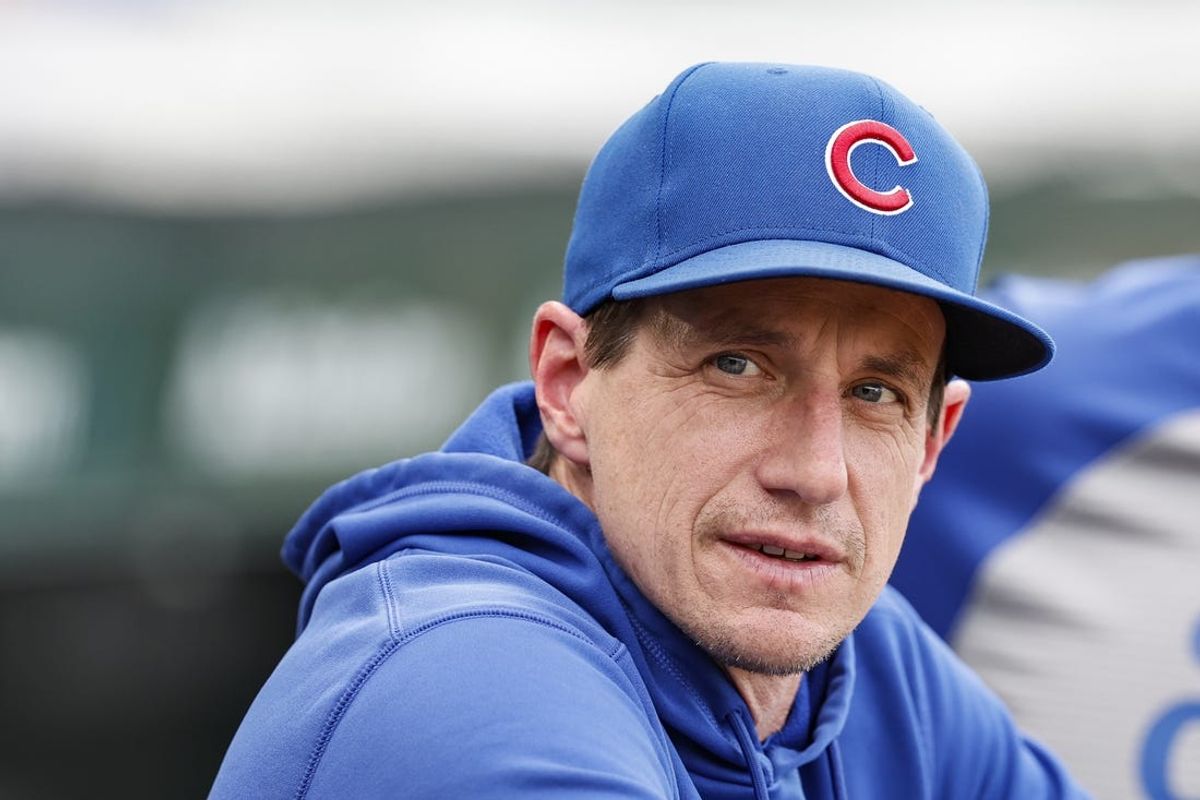 May 21, 2024; Chicago, Illinois, USA; Chicago Cubs manager Craig Counsell (30) looks on from dugout before a baseball game against the Atlanta Braves at Wrigley Field. Mandatory Credit: Kamil Krzaczynski-USA TODAY Sports