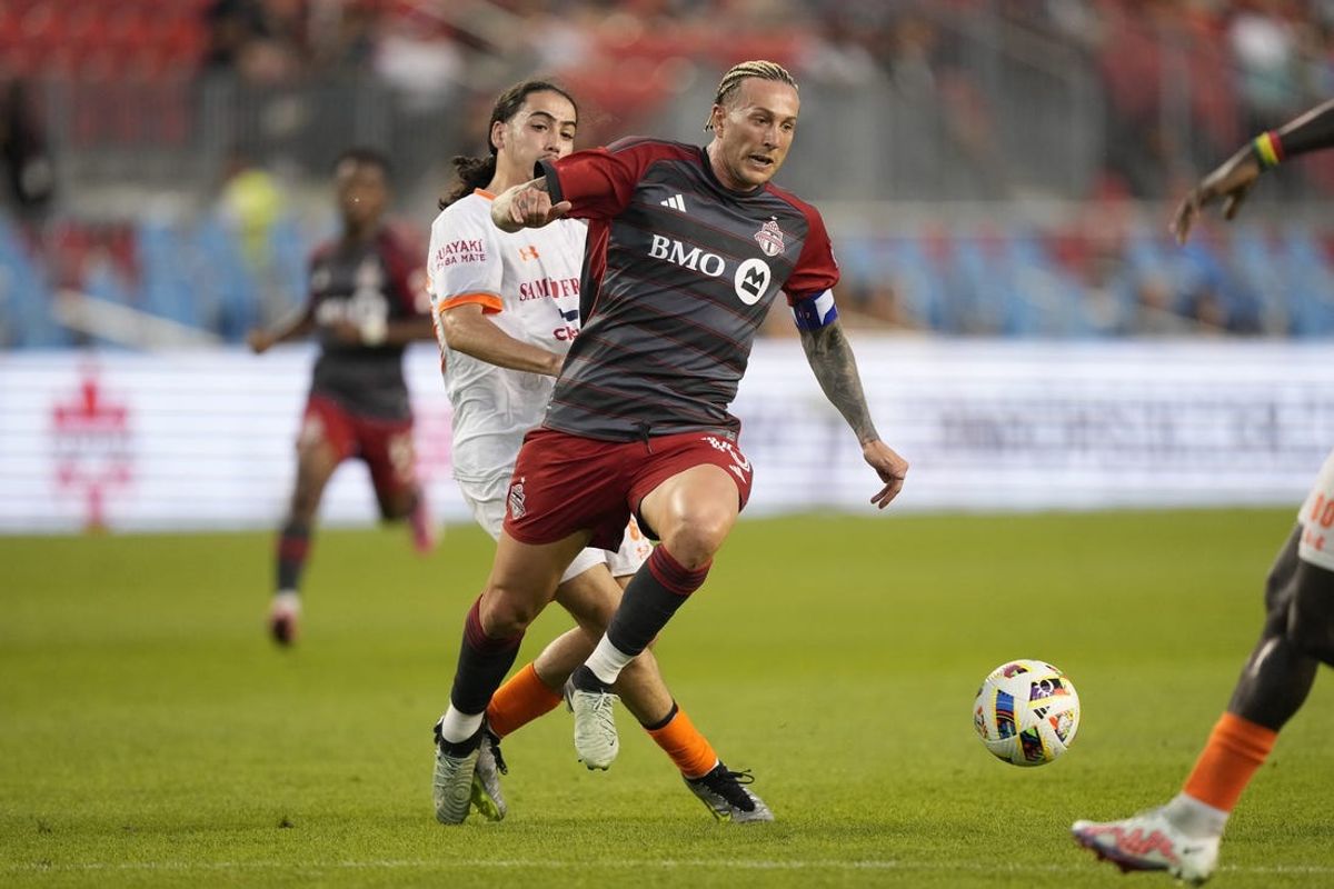 May 21, 2024; Toronto, Ontario, CAN; Toronto FC forward Federico Bernardeschi (10) controls the ball against CS Saint-Laurent defender Nathan Goulet (6) during the second half at BMO Field. Mandatory Credit: John E. Sokolowski-USA TODAY Sports