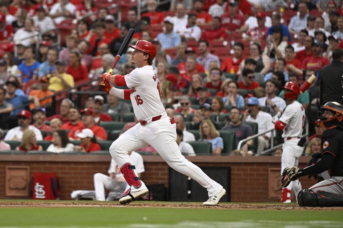May 21, 2024; St. Louis, Missouri, USA; St. Louis Cardinals second baseman Nolan Gorman (16) watches the ball after hitting a 1-run double against the Baltimore Orioles during the second inning at Busch Stadium. Mandatory Credit: Jeff Le-USA TODAY Sports
