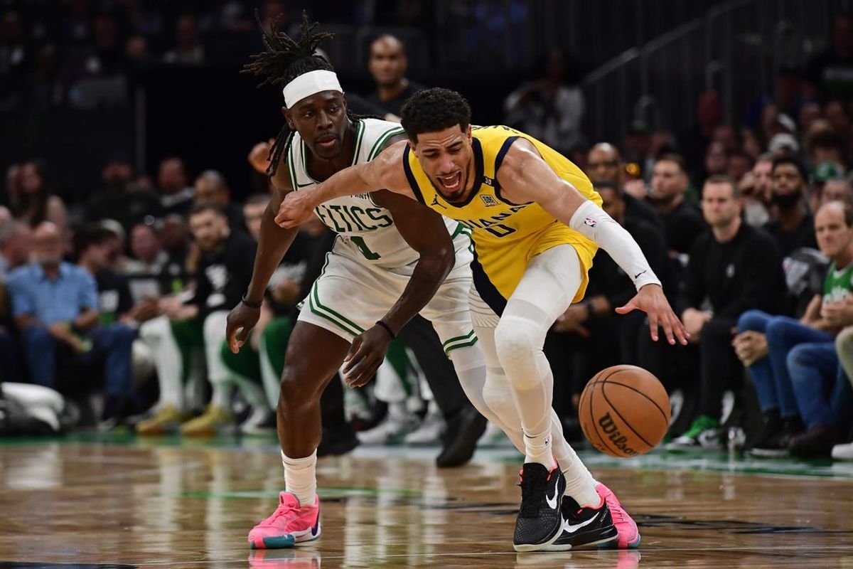 May 21, 2024; Boston, Massachusetts, USA; Indiana Pacers guard Tyrese Haliburton (0) steals the ball from Boston Celtics guard Jrue Holiday (4) during the second half for game one of the eastern conference finals for the 2024 NBA playoffs at TD Garden. Mandatory Credit: Bob DeChiara-USA TODAY Sports